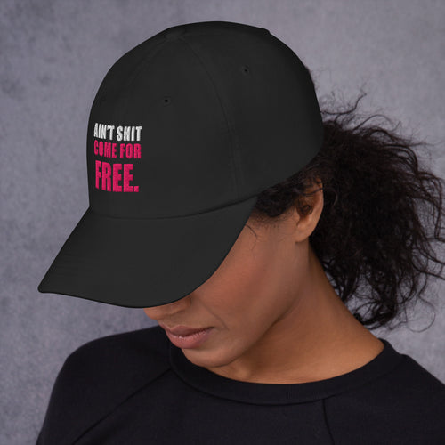 Model wearing black Ain't Shit Come for Free embroidered cap, left-side view