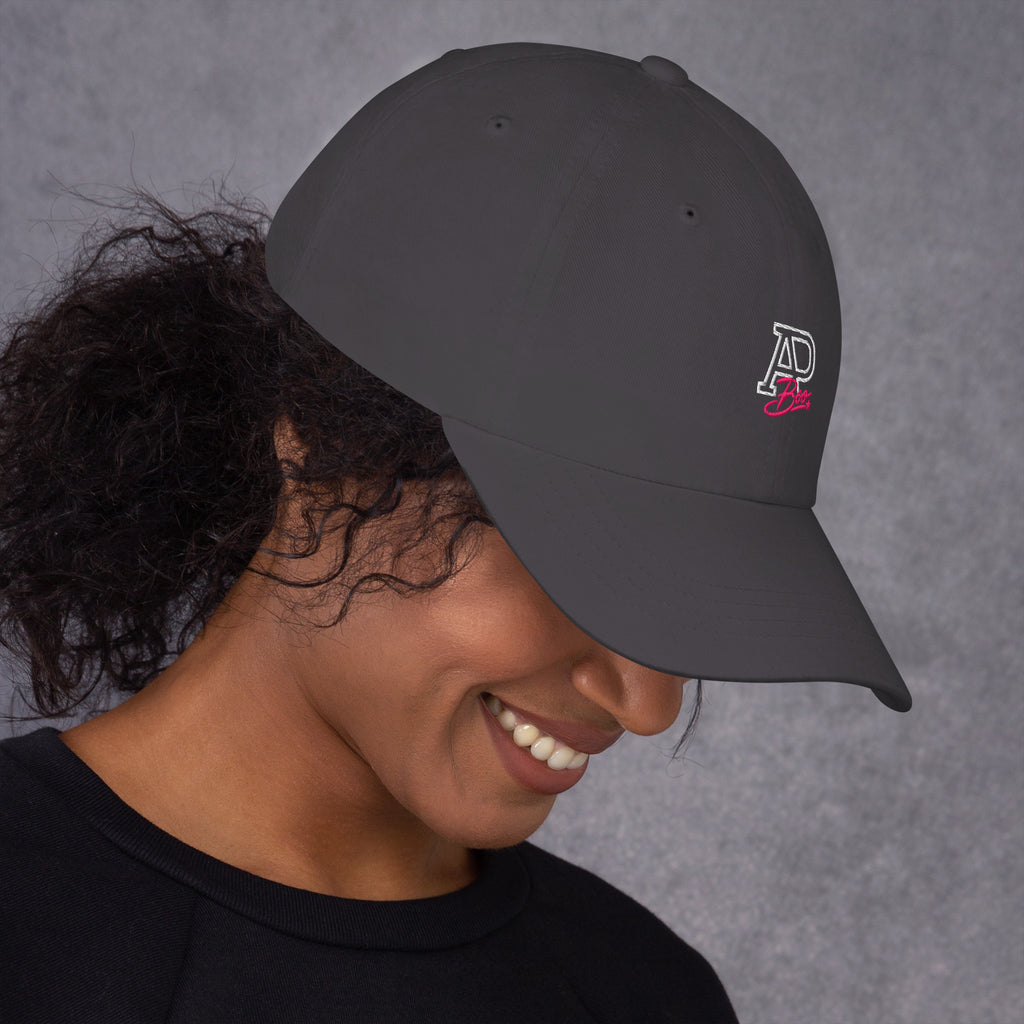 Model wearing dark gray APBoo embroidered cap, right-side view