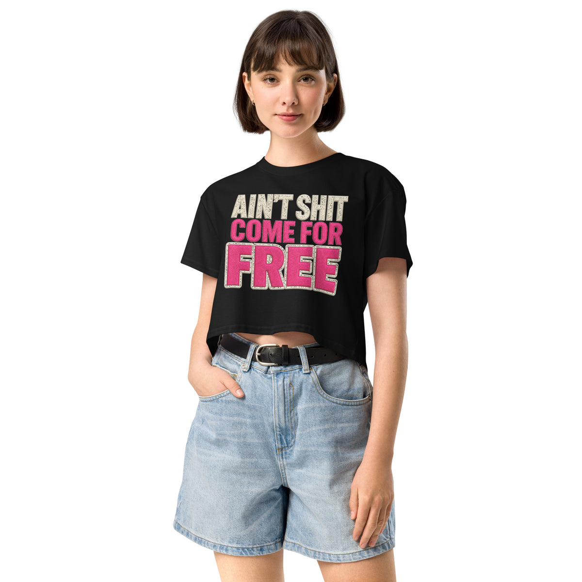 Model wearing black Ain't Shit Come for Free crop top, front view